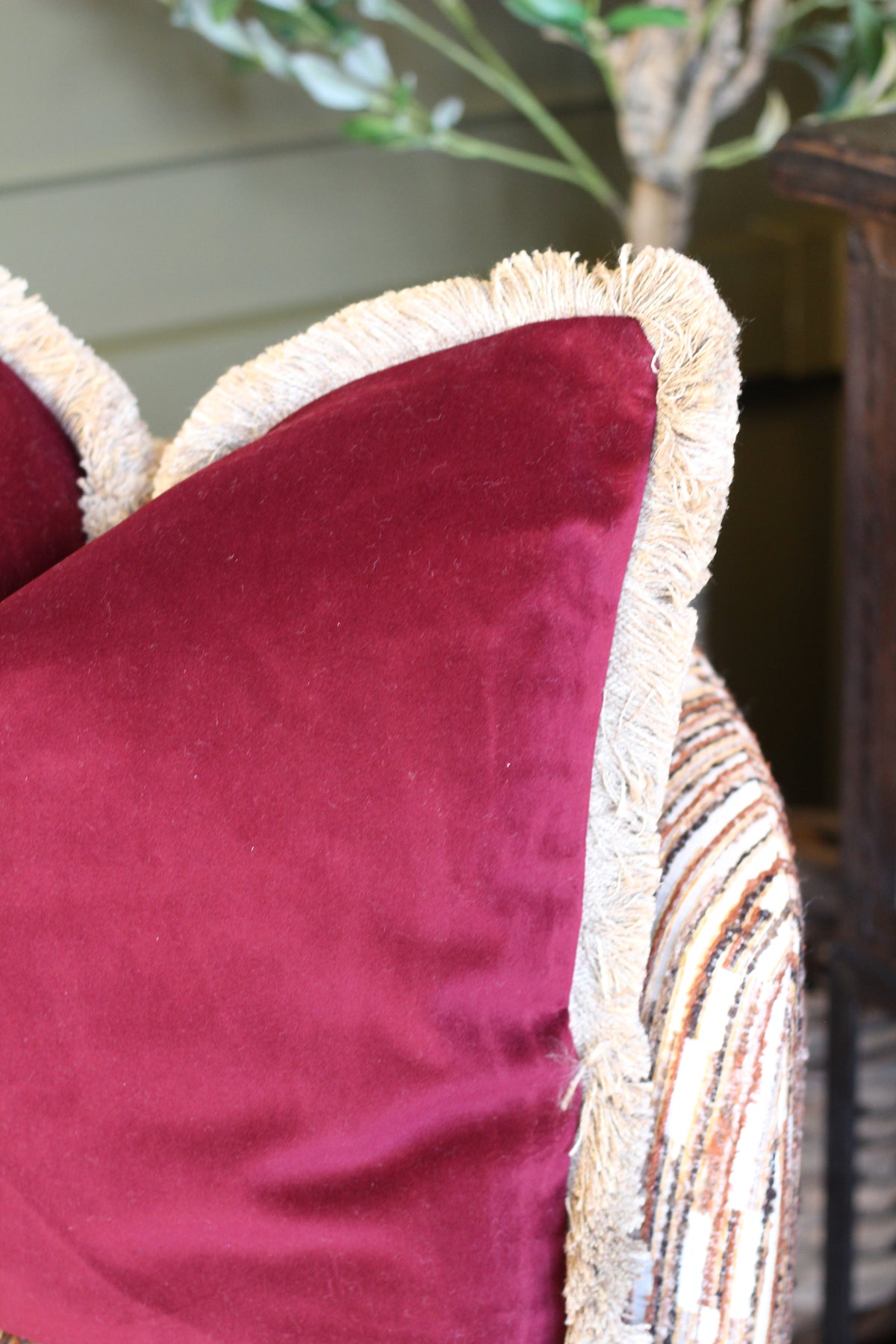 Langford Claret fringed velvet cushion in a deep claret tone, 55 x 55cm