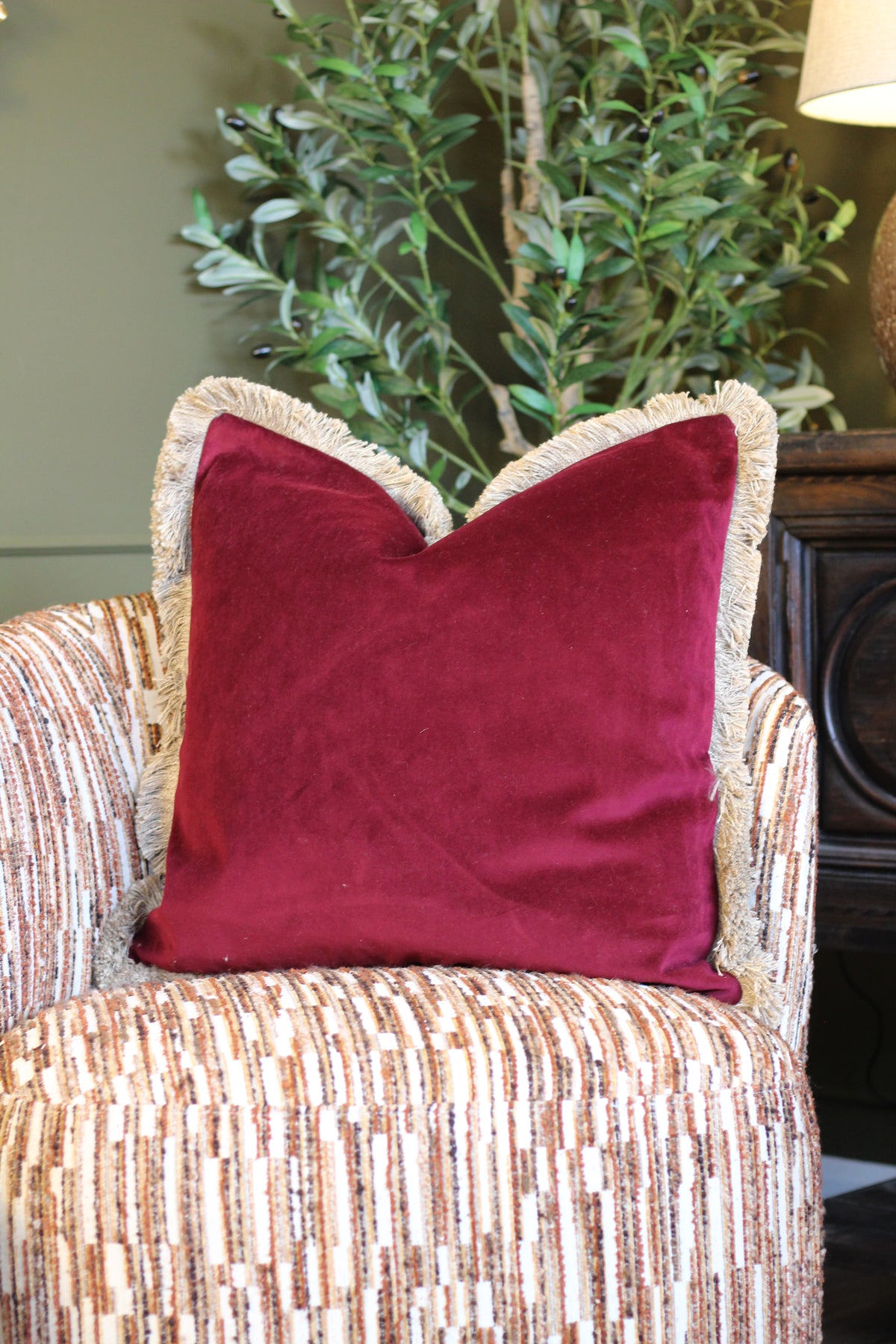 Langford Claret fringed velvet cushion in a deep claret tone, 55 x 55cm