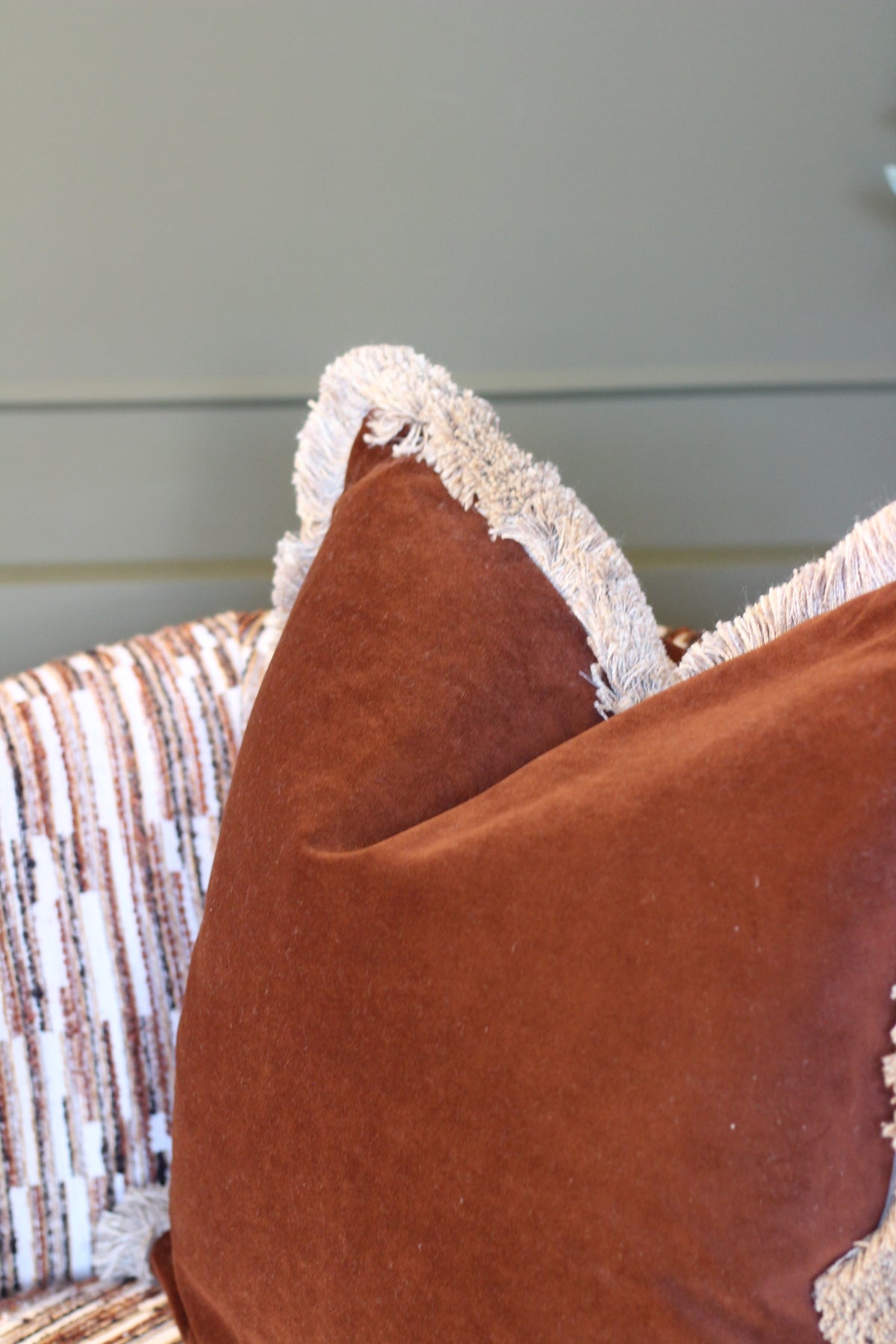 Langford Chestnut fringed velvet cushion in a rich warm brown, 55 x 55cm