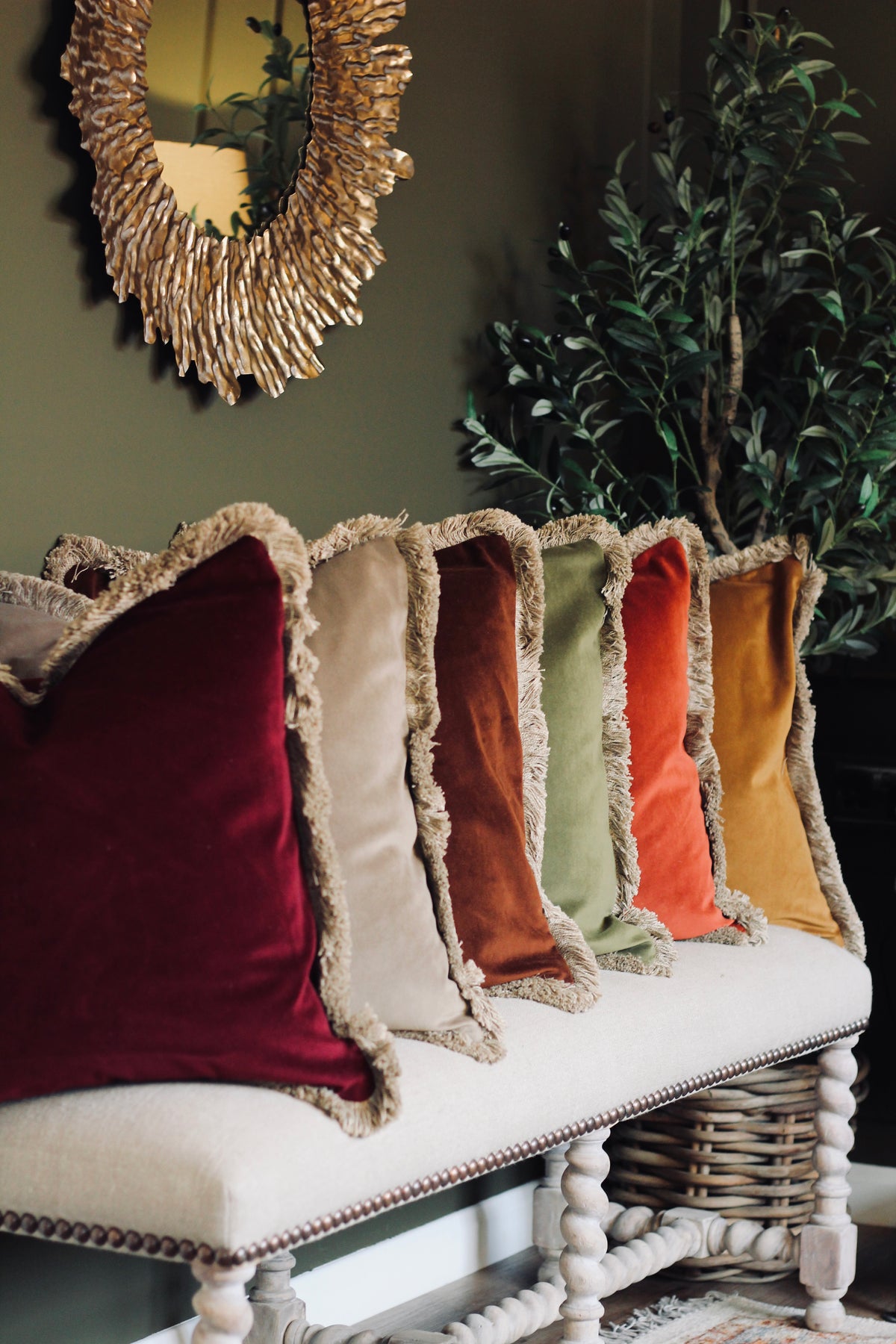 Langford Rust fringed velvet cushion in a warm rust tone, 55 x 55cm