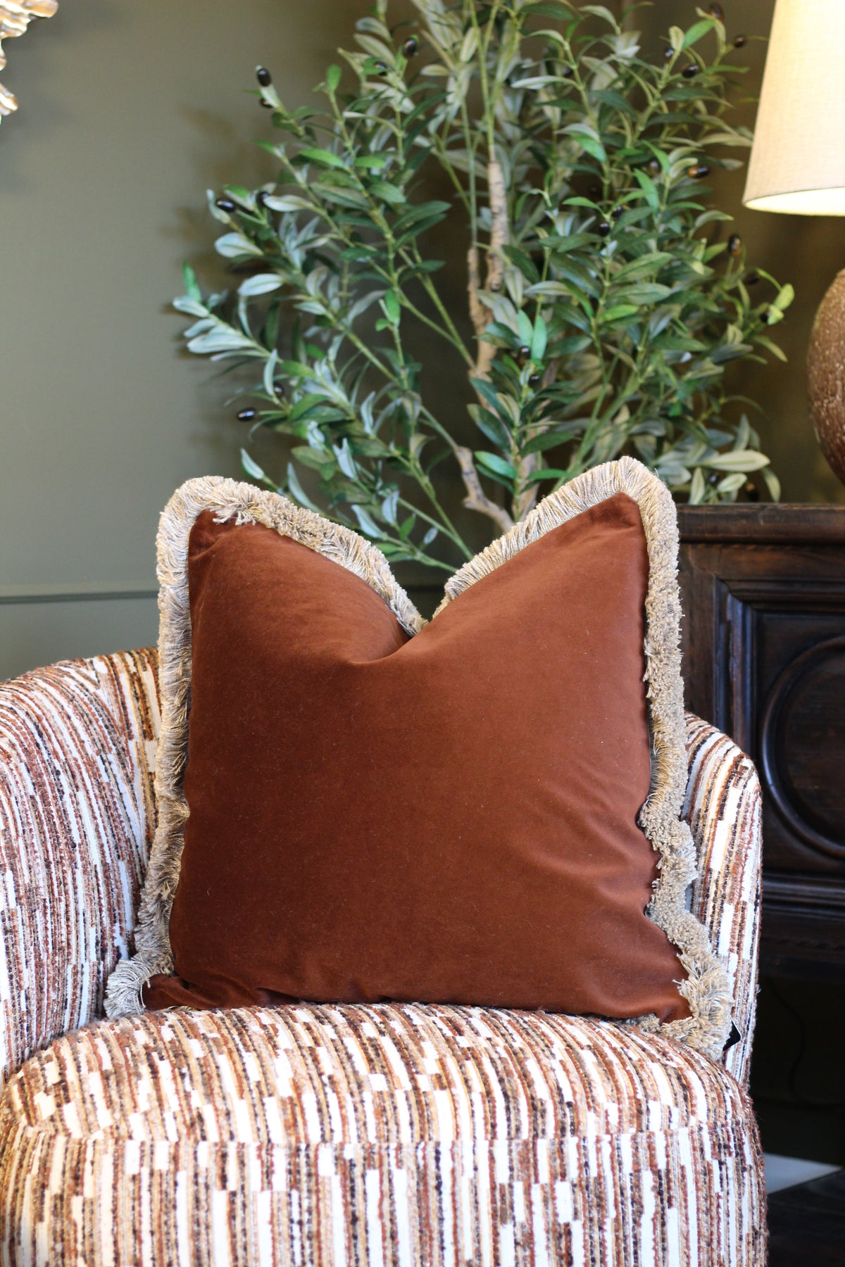 Langford Chestnut fringed velvet cushion in a rich warm brown, 55 x 55cm