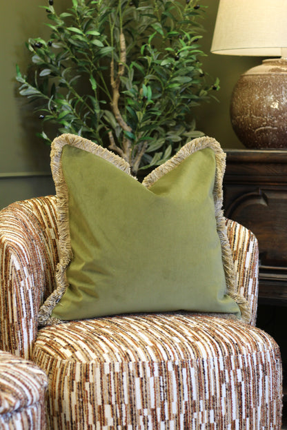 Langford Olive fringed velvet cushion in an earthy olive green, 55 x 55cm