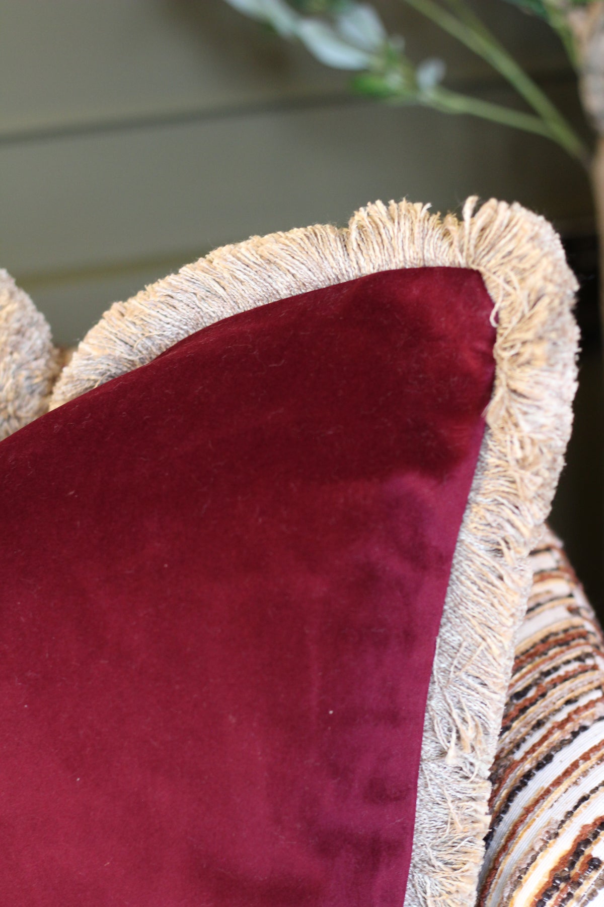 Langford Claret fringed velvet cushion in a deep claret tone, 55 x 55cm