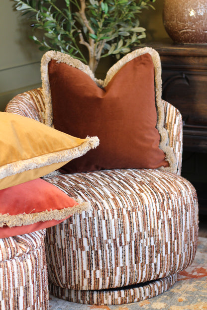 Langford Whiskey fringed velvet cushion in a warm whiskey tone, 55 x 55cm