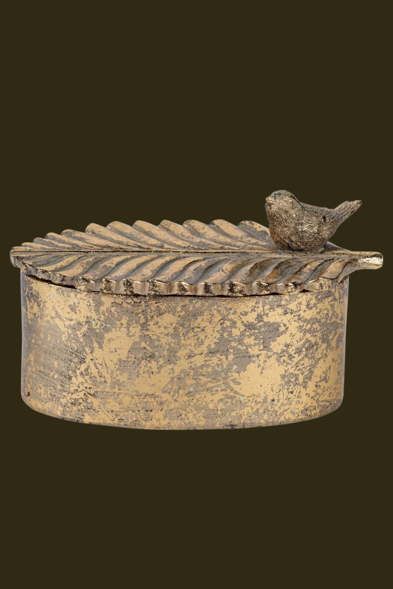 Antique gold bird trinket box styled as a decorative home accessory.