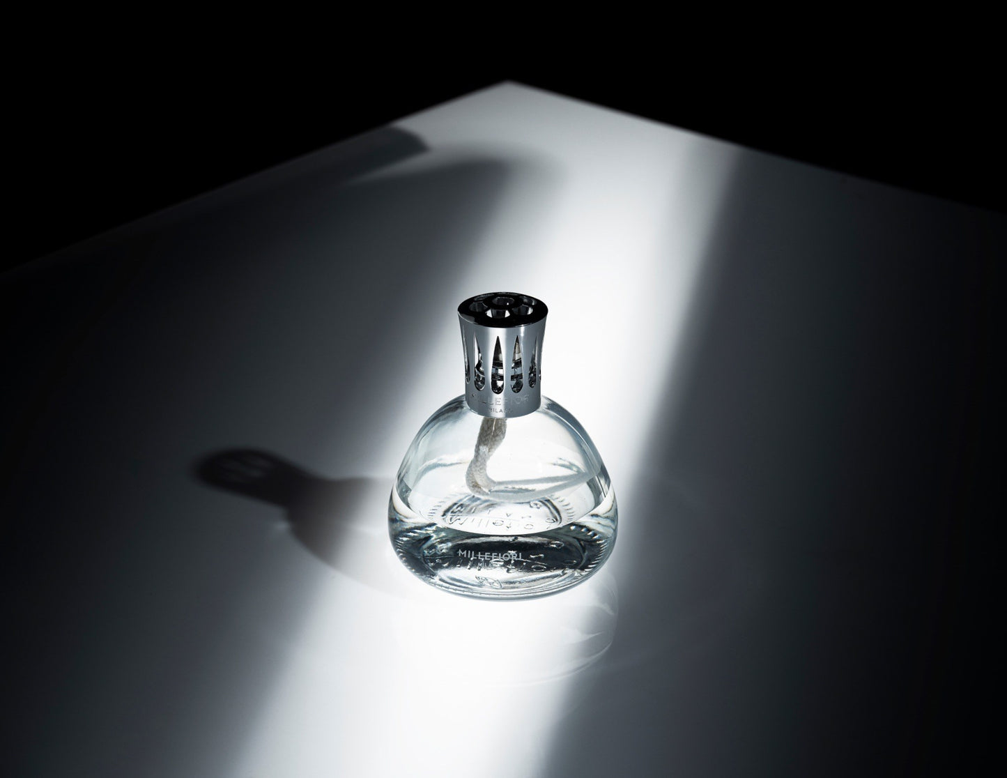 Millefiori Transparent Fragrance Lamp styled with dramatic light