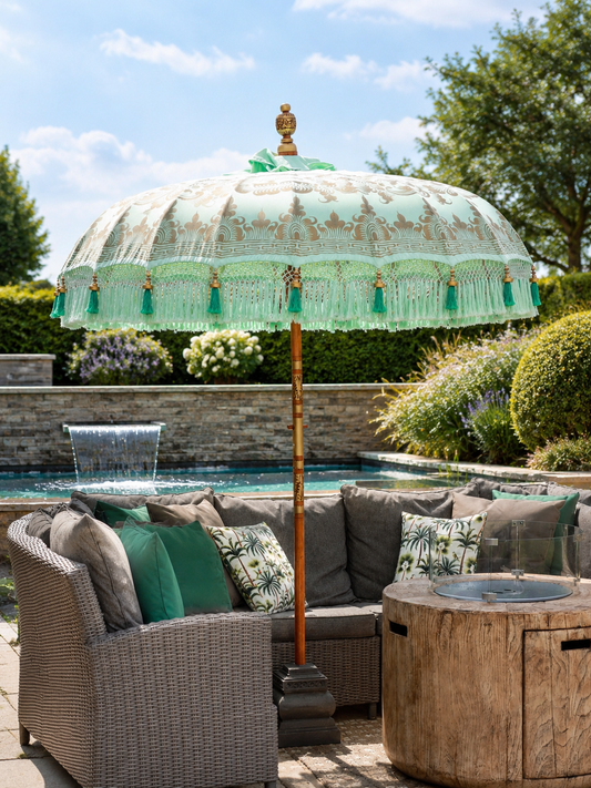 Riviera Mint Garden Parasol and Base styled on an elegant outdoor terrace